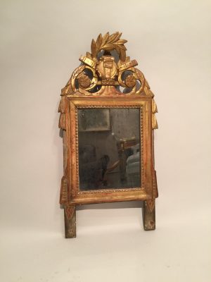 Miroir d’époque Louis XVI en bois doré.