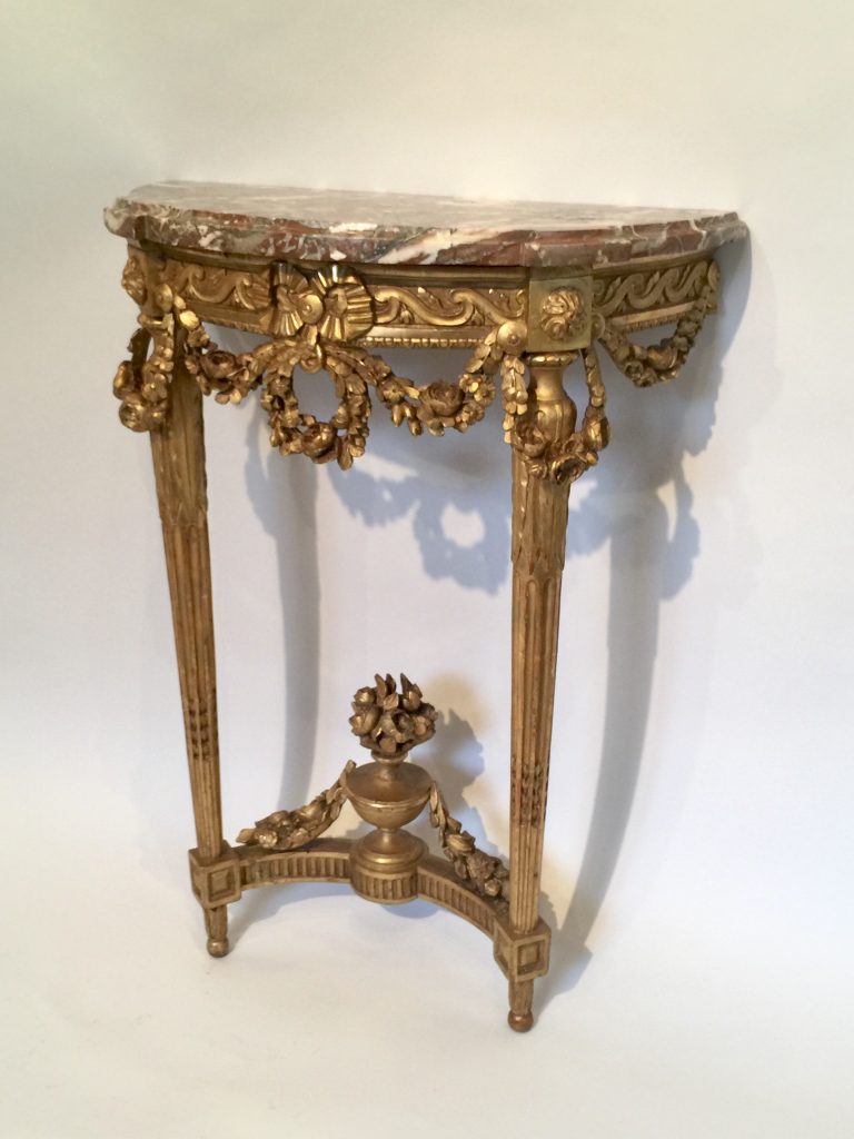 Console d’époque Louis XVI en bois doré.
