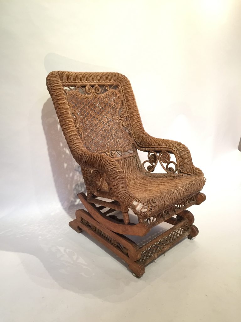 Rocking-chair en rotin d’époque fin XIX ème siècle.