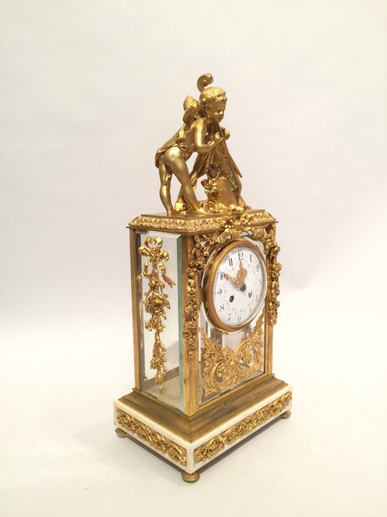 Pendule en bronze et vitres dite « cage » d’époque Napoléon III.