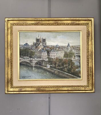 Tableau d’une vue de la Seine et de Paris, signé Maurice GHIGLION-GREEN.
